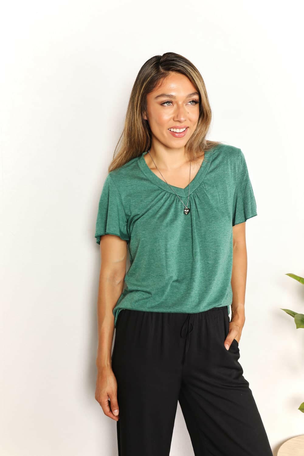 Double Take Ruched V-Neck Short Sleeve T-ShirtDouble Take Ruched V-Neck Short Sleeve T-Shirt
 Discover your new favorite tee! The Double Take Ruched V-Neck Short Sleeve T-Shirt effortlessly combines style and coLove Salve -Neck Short Sleeveplus