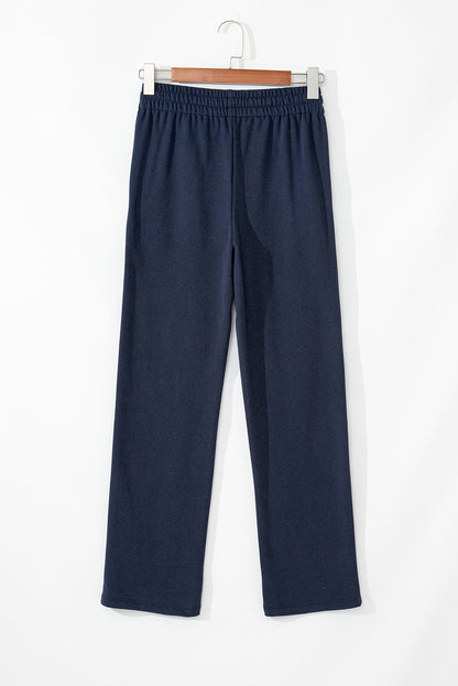 Navy blue fleece-lined casual pants with drawstring waist