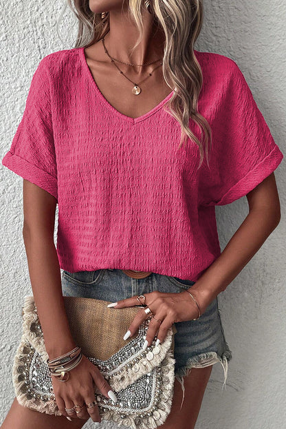 Chic bright pink rolled sleeve V neck tee for effortless style