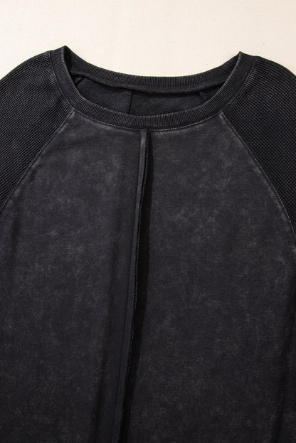 Chic black waffle knit raglan sleeve sweatshirt with patchwork detail