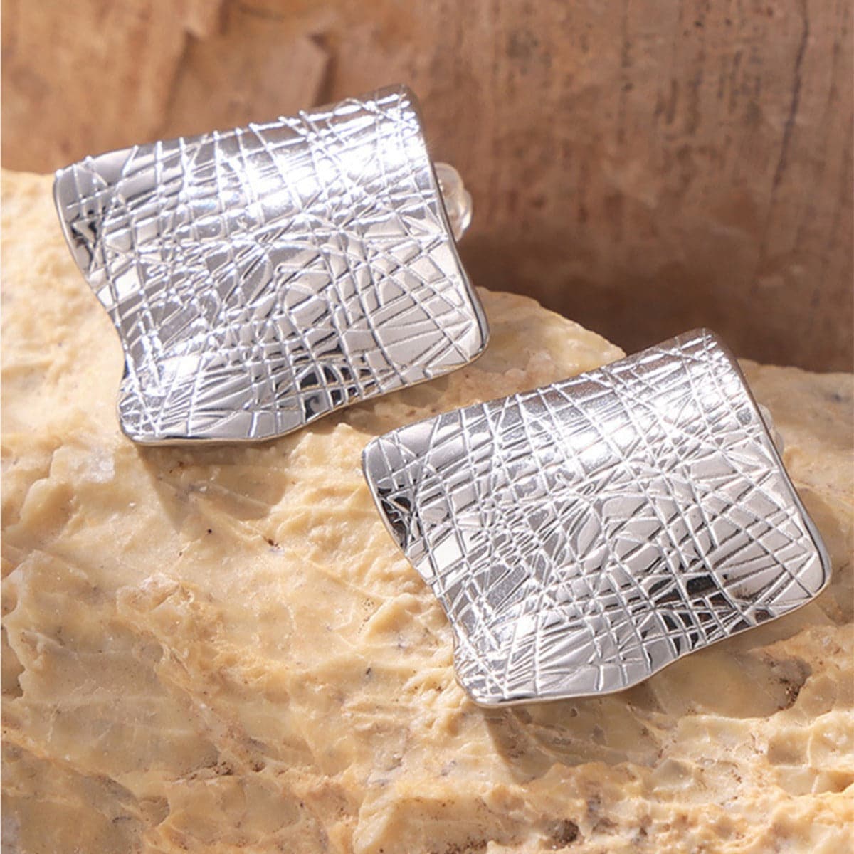 Textured Titanium Steel Stud Earrings.