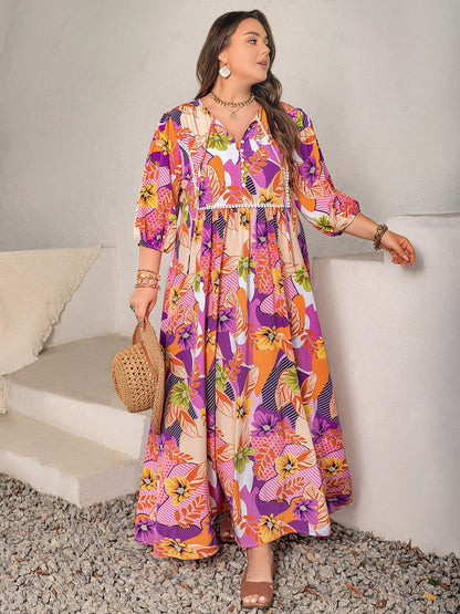 Plus Size Printed Tie Neck Maxi Dress.