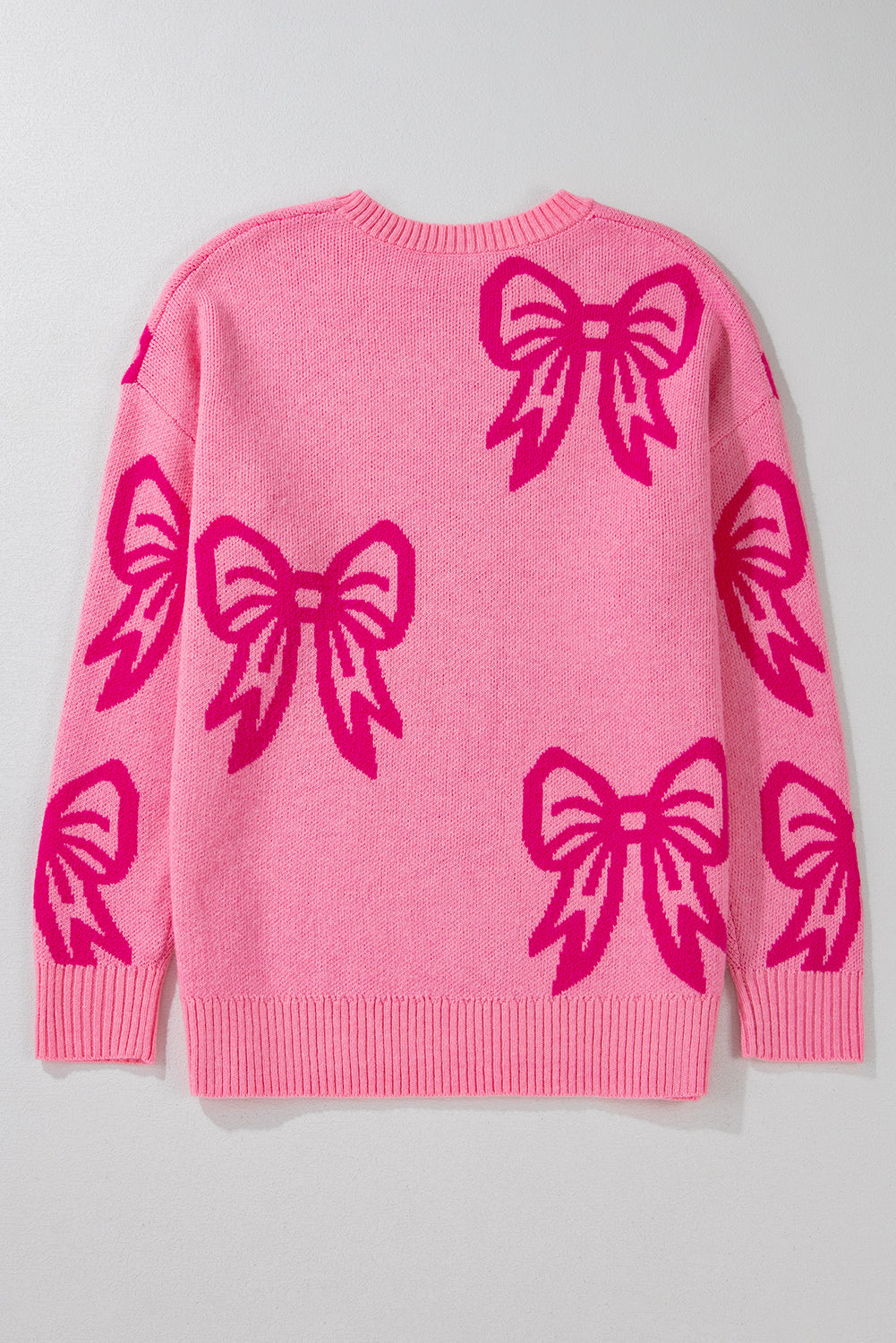 Feminine Pink Bow Print Loose Fit Sweater with Drop Shoulders