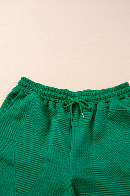 Chic dark green ruffle top and drawstring shorts set