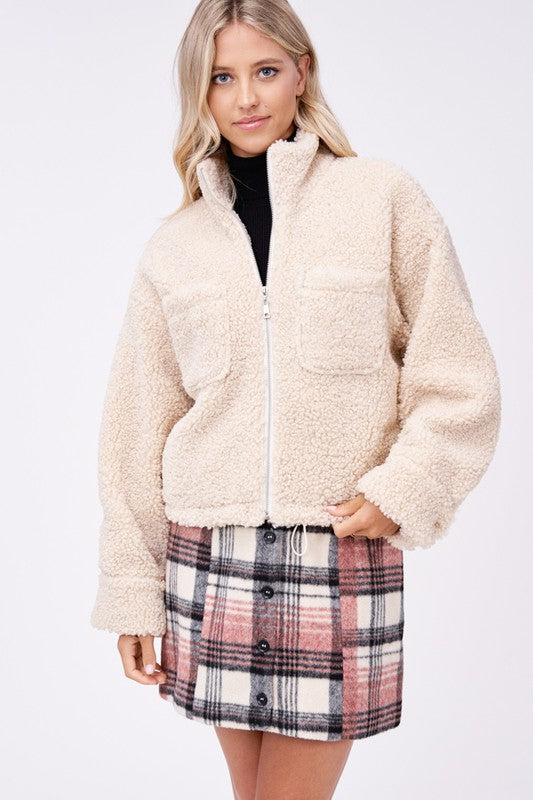 Cozy sherpa jacket with convenient front pockets