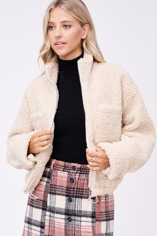 Cozy sherpa jacket with convenient front pockets