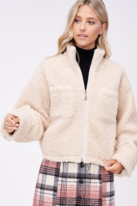 Cozy sherpa jacket with convenient front pockets