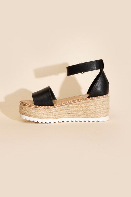 TUCKIN-S PLATFORM SANDALS.