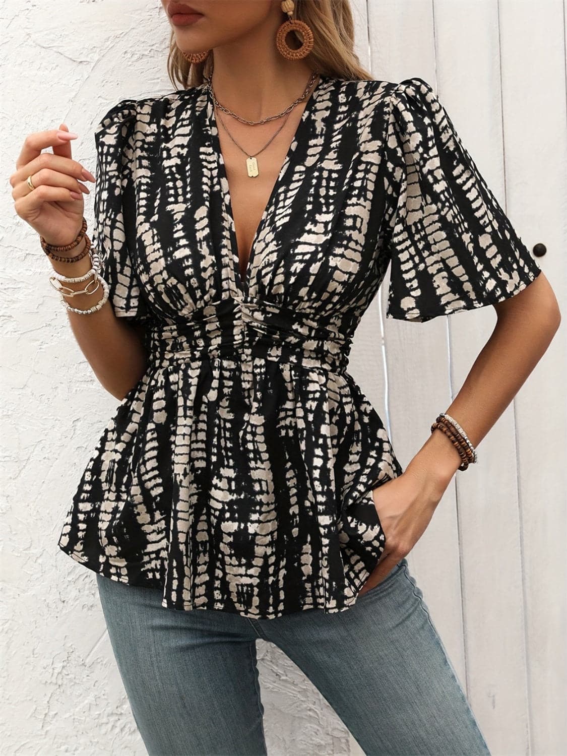 Printed V-Neck Half Sleeve Blouse.