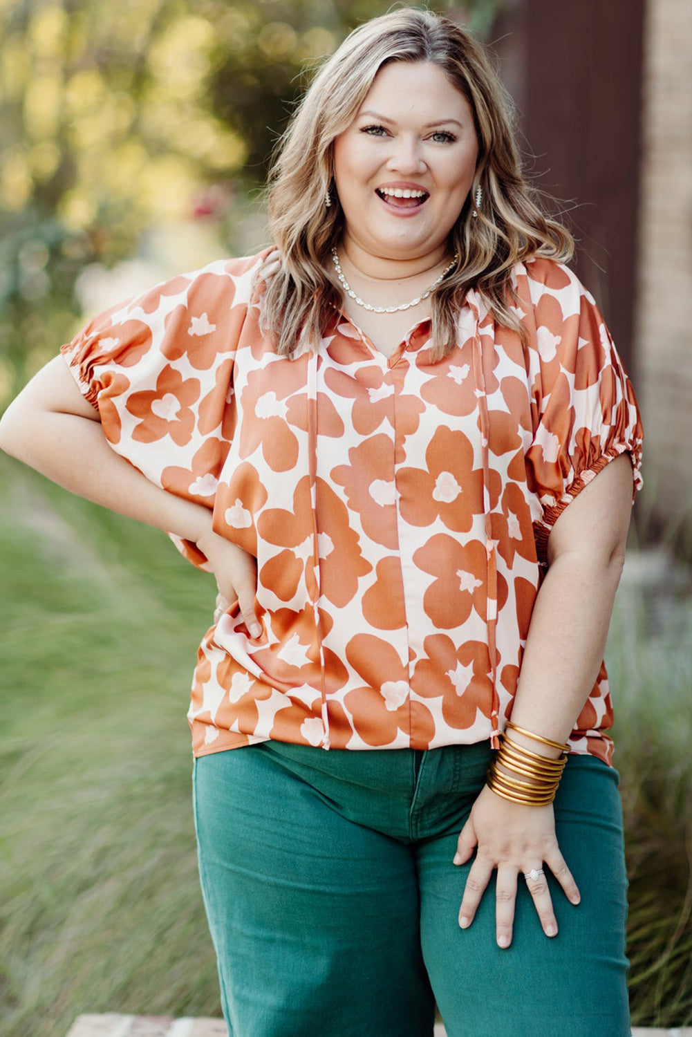 Floral Delight: Plus Size Orange V Neck Blouse with Drawstring Detail