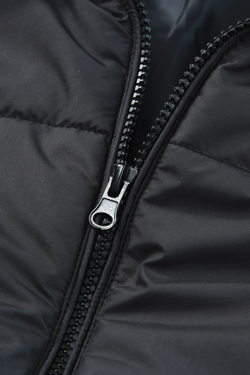 Sleek black winter puffer coat