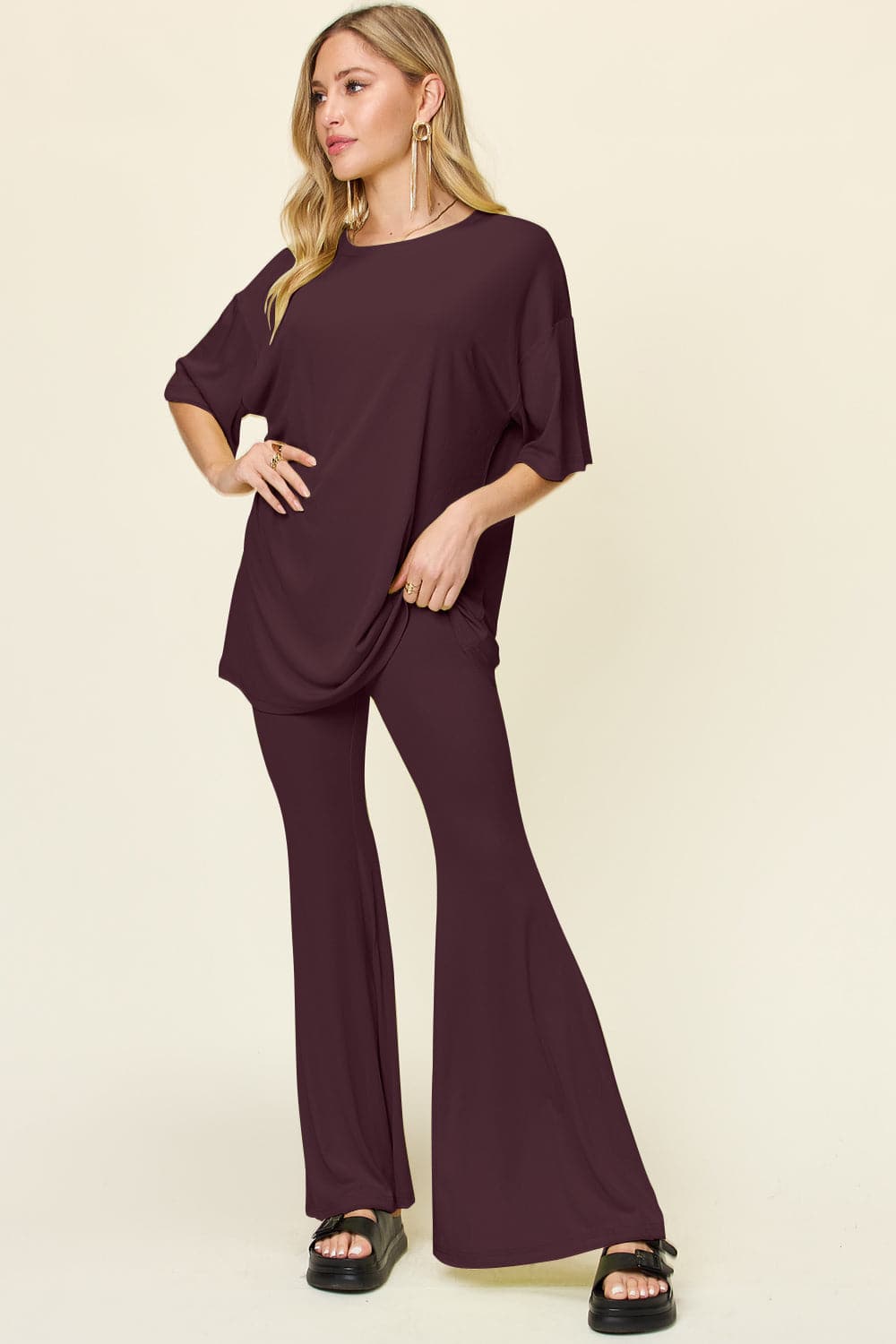 Double Take Full Size Round Neck Drop Shoulder T-Shirt and Flare Pants Set.