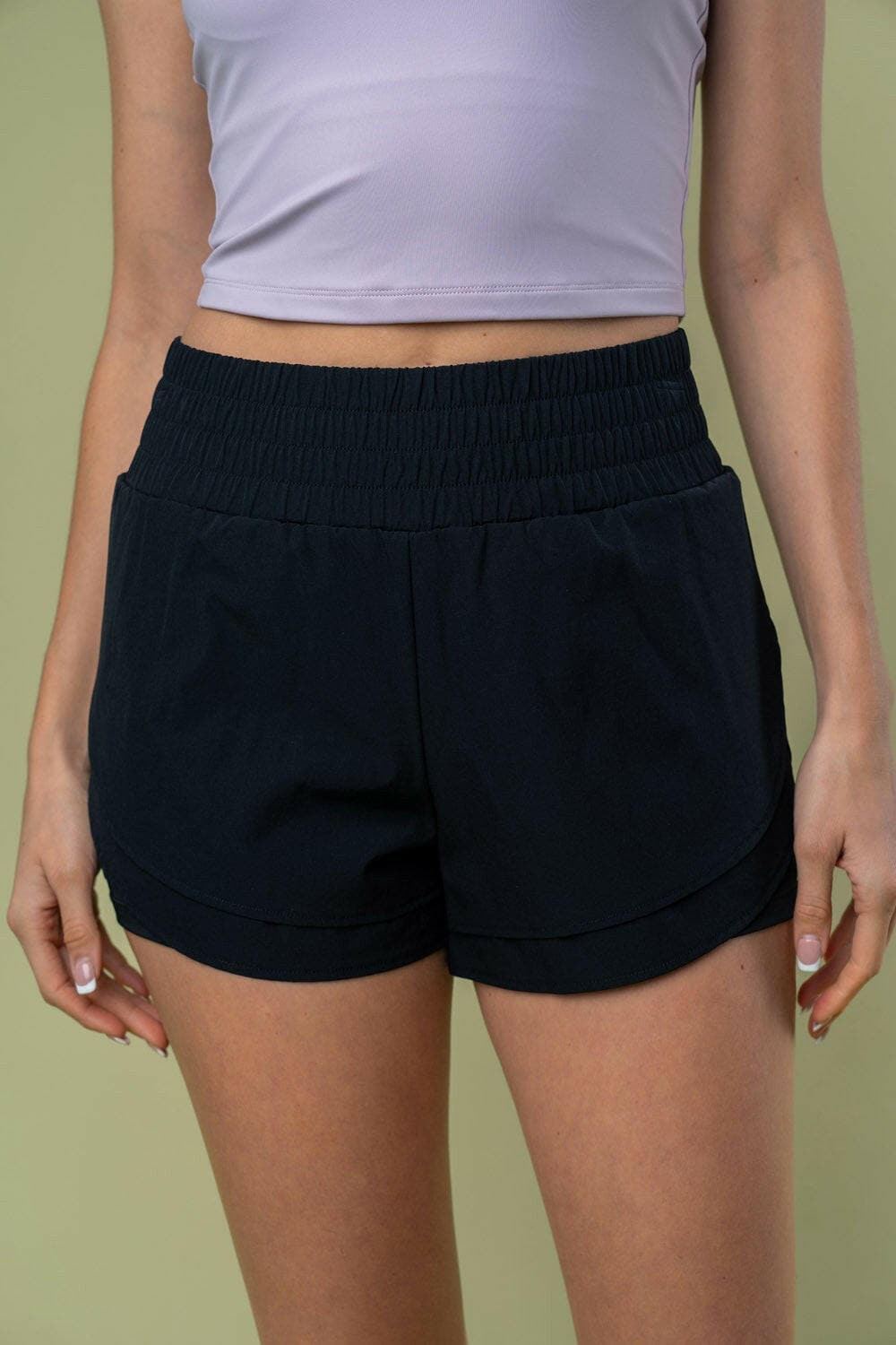 White Birch Full Size High Waisted Knit Shorts with elastic waistband and pockets.