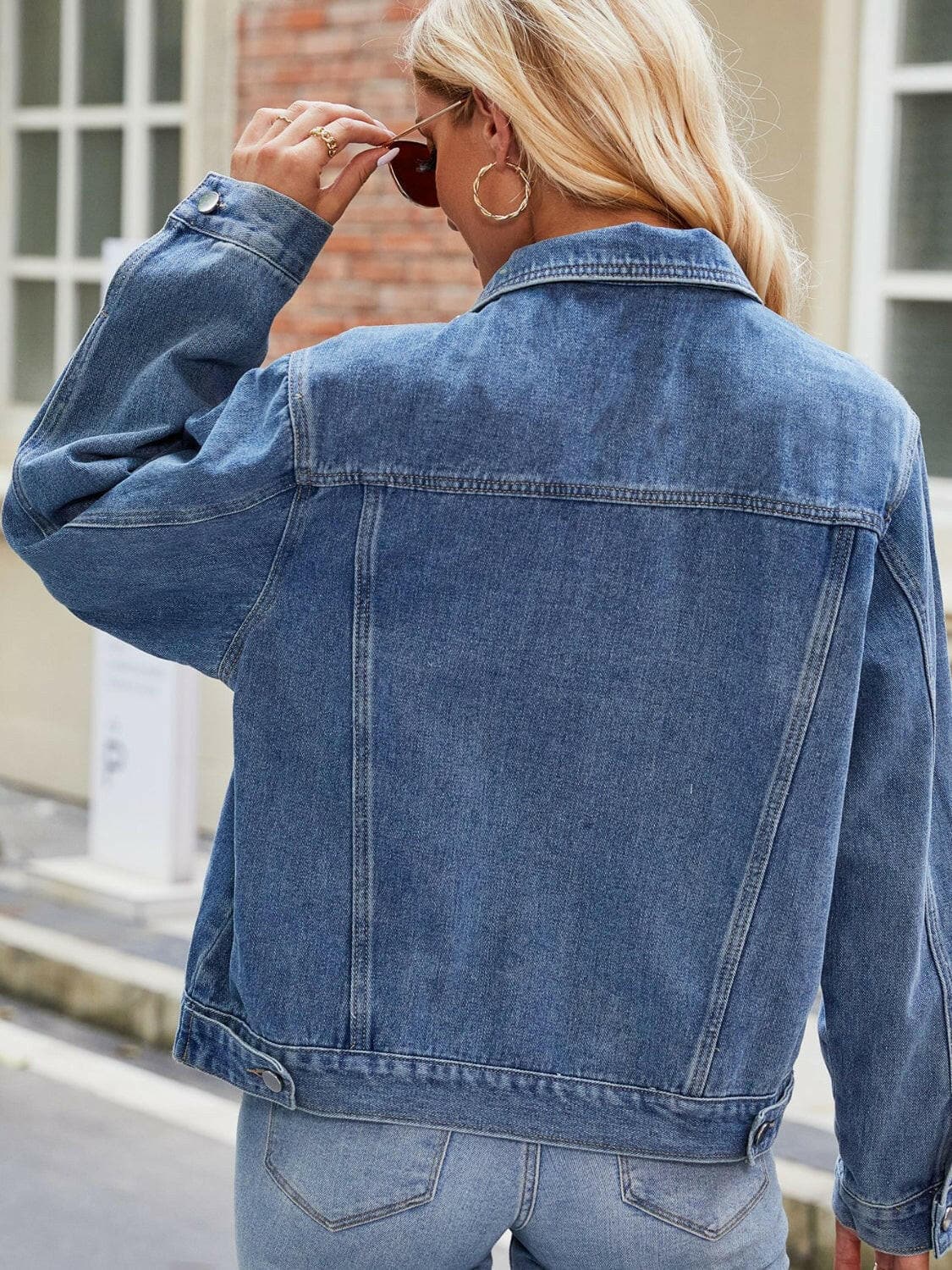 Pocketed Collared Neck Denim Jacket.