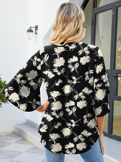 Printed Notched Half Sleeve Blouse.