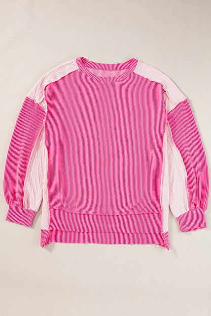 Chic cable knit colorblock sweatshirt with exposed seams