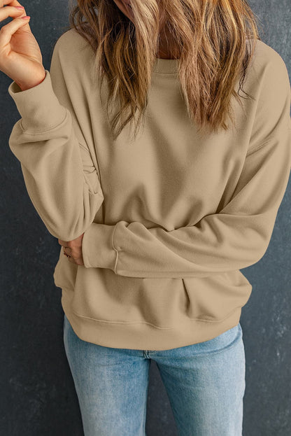 Round Neck Dropped Shoulder Sweatshirt.