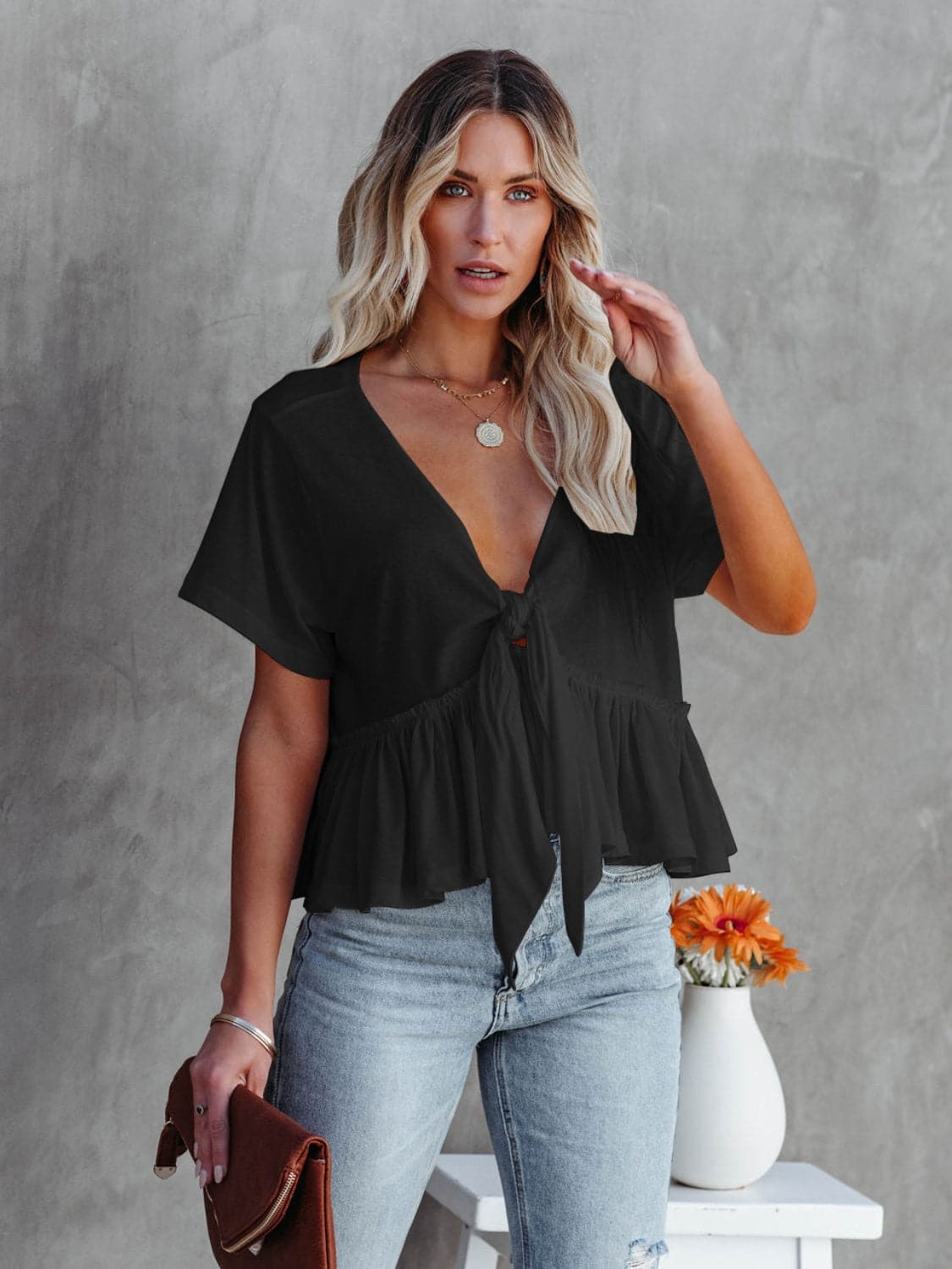 Tied Plunge Short Sleeve Blouse.