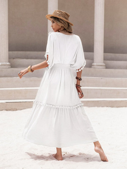 Tassel Trim Smocked V-Neck Short Sleeve Dress.