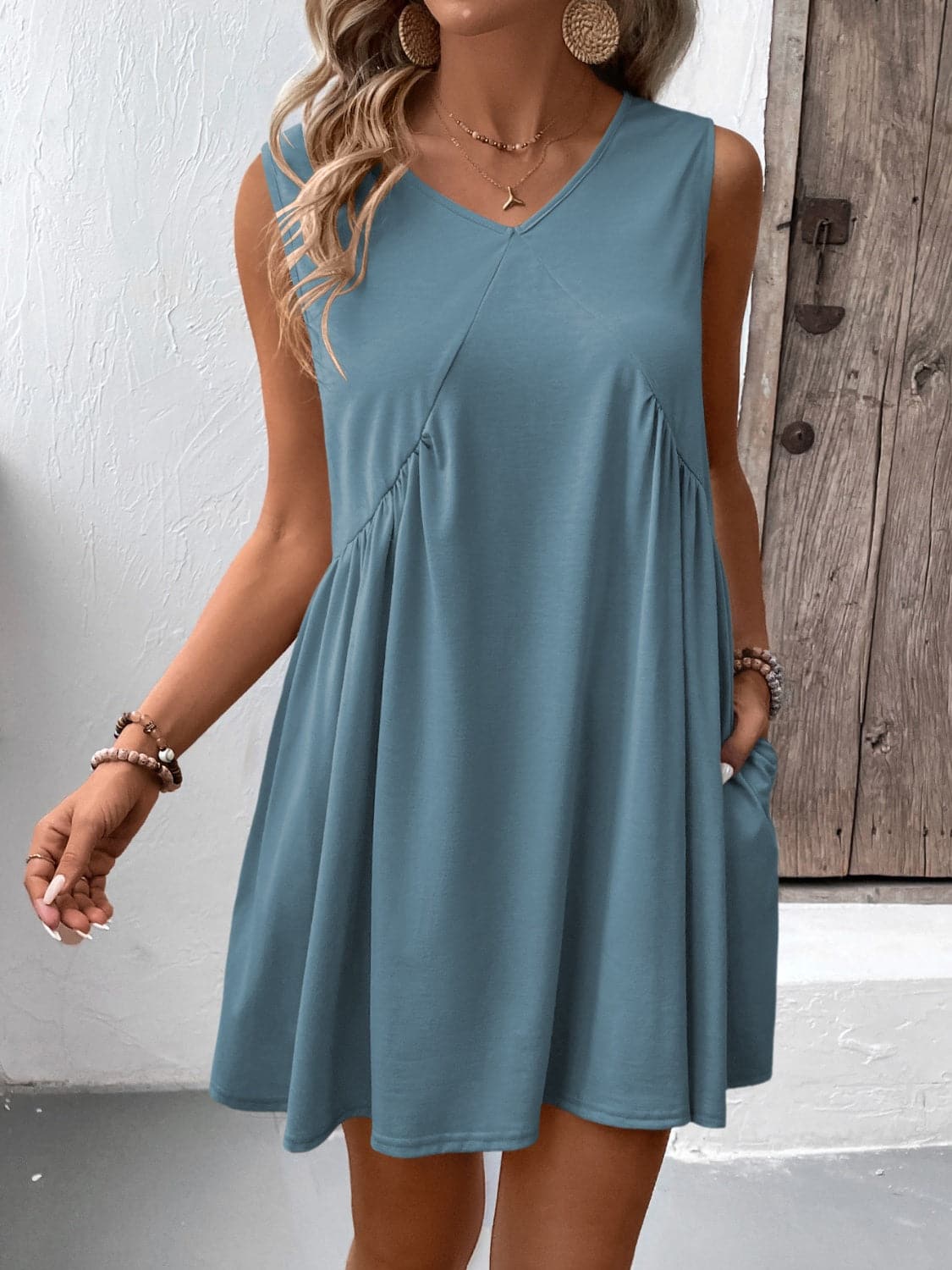 Ruched V-Neck Sleeveless Mini Dress.