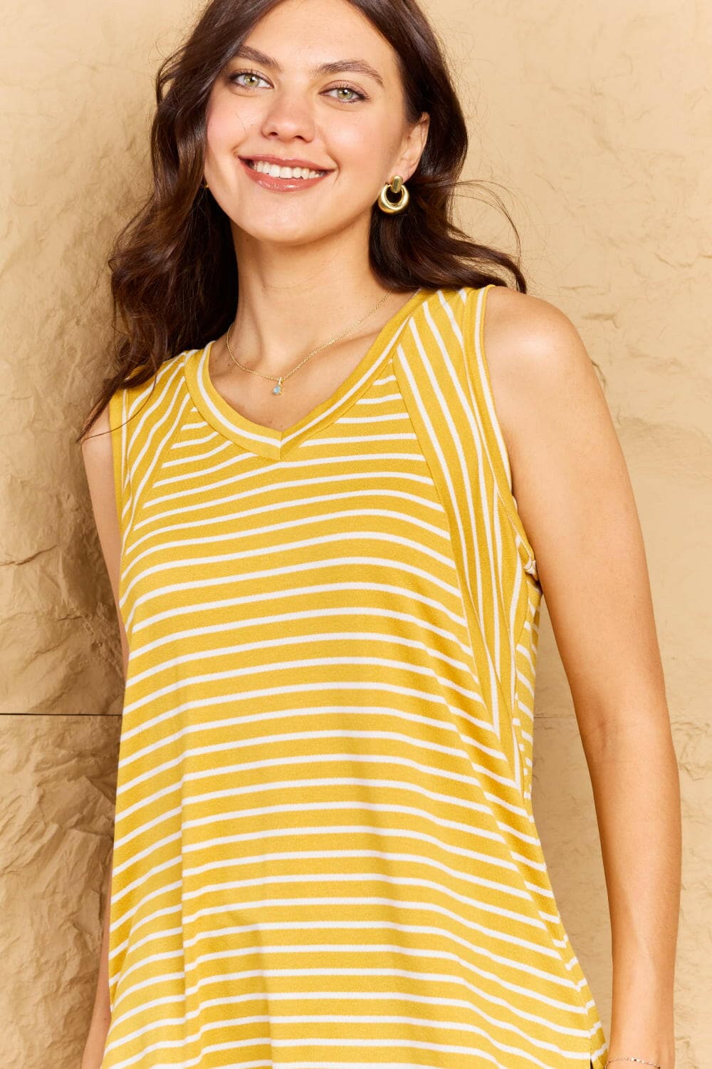 Doublju Talk To Me Full Size Striped Sleeveless V-Neck TopElevate Your Style with the Doublju Talk To Me Top
 Discover the perfect blend of comfort and chic fashion with the Doublju Talk To Me Full Size Striped Sleeveless VLove Salve Full Size Striped SleevelessTIKTOK