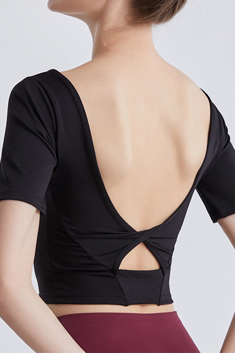 Cutout Backless Round Neck Active T-Shirt.