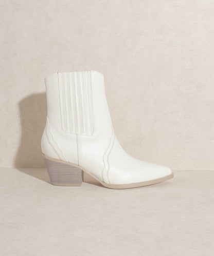 Western-inspired Chelsea bootie with elegant stitch detailing