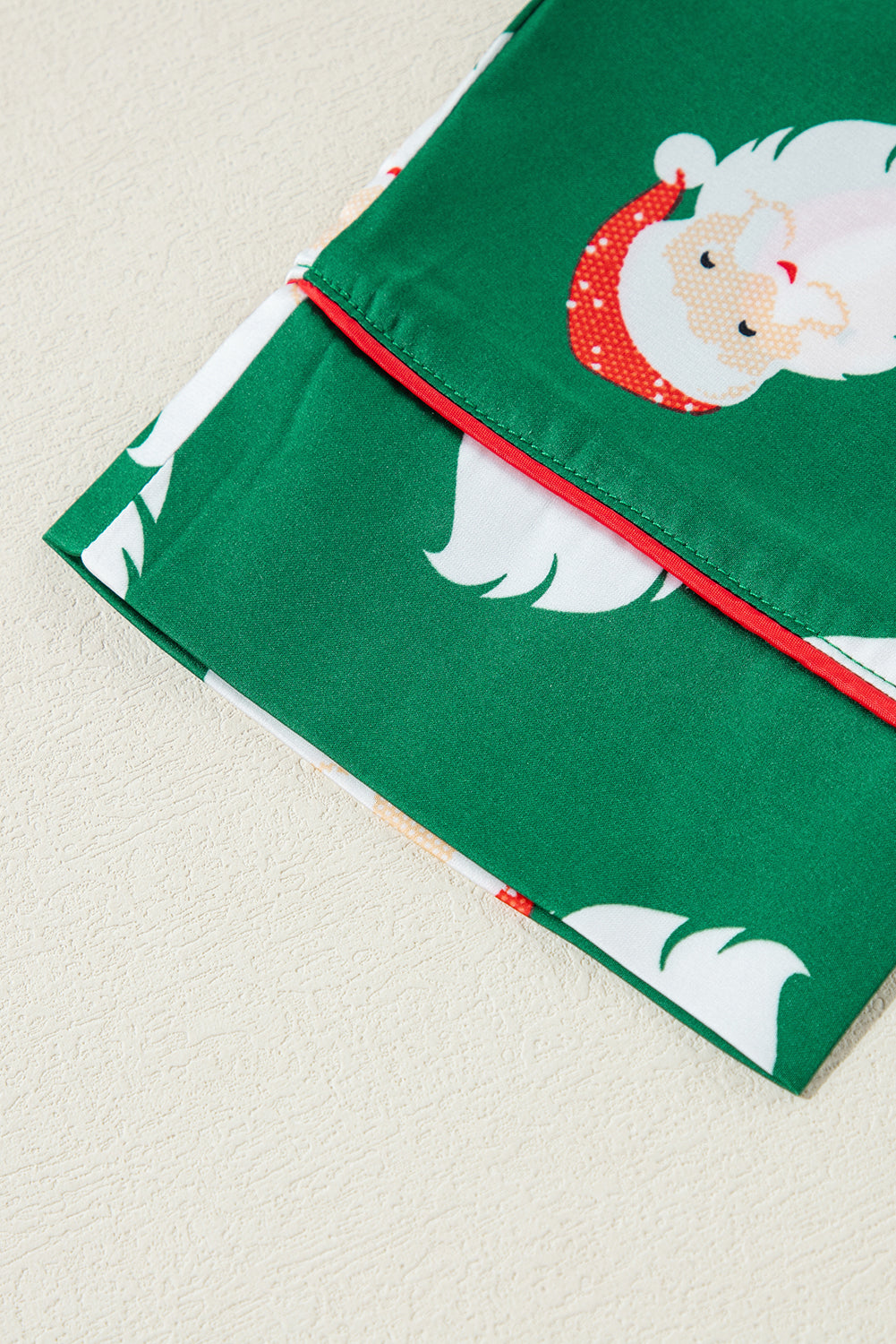 Festive green satin Santa Claus pajama set with shorts