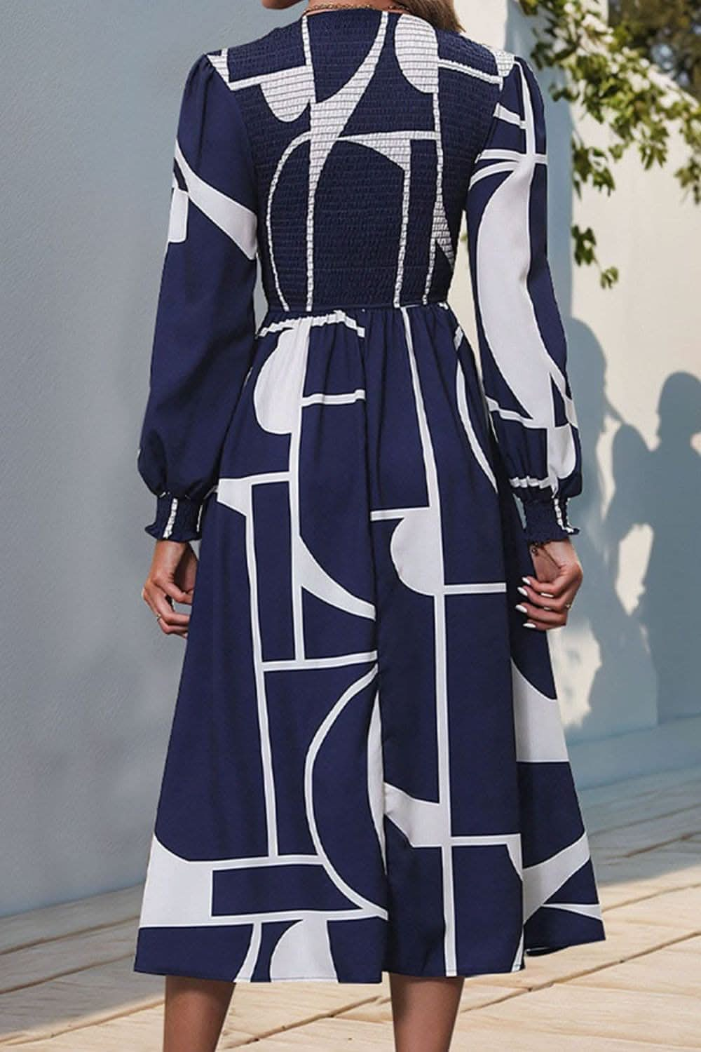 Smocked Color Block Long Sleeve Midi Dress.