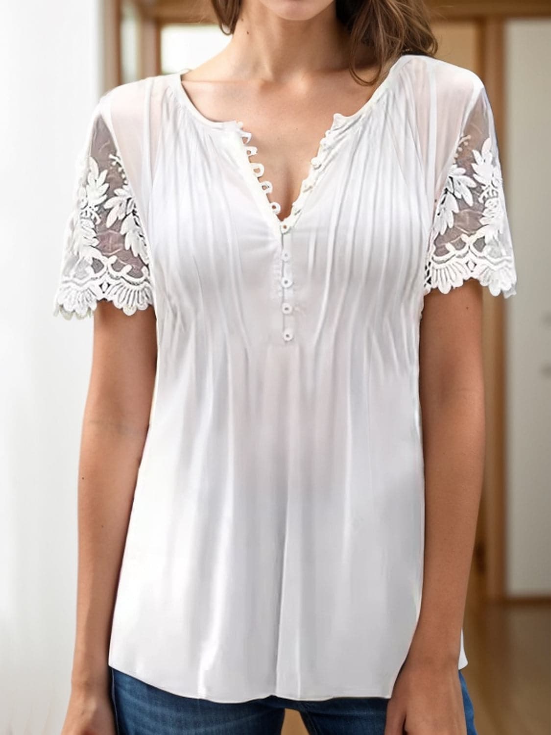 Notched Lace Short Sleeve Top.