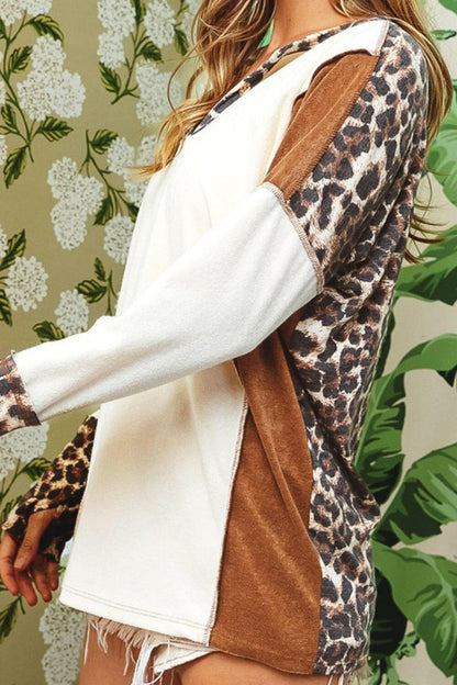 Leopard V-Neck Dropped Shoulder BlouseUpgrade Your Wardrobe with Style and Comfort
 Indulge in effortless elegance with our Leopard V-Neck Dropped Shoulder Blouse. This versatile blouse is a must-have foLove Salve -Neck Dropped Shoulder BlouseBlouses