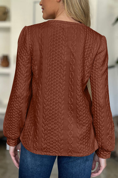 Textured Round Neck Long Sleeve Sweatshirt.