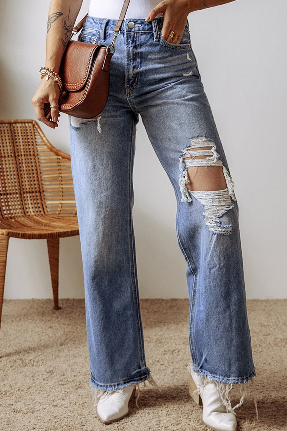 Distressed Straight Leg Jeans with Pockets.