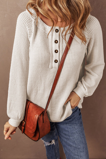 Cozy oatmeal waffle knit blouse with buttoned front and raglan sleeves