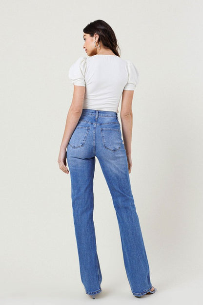 Trendy high-rise distressed straight jeans for a chic look