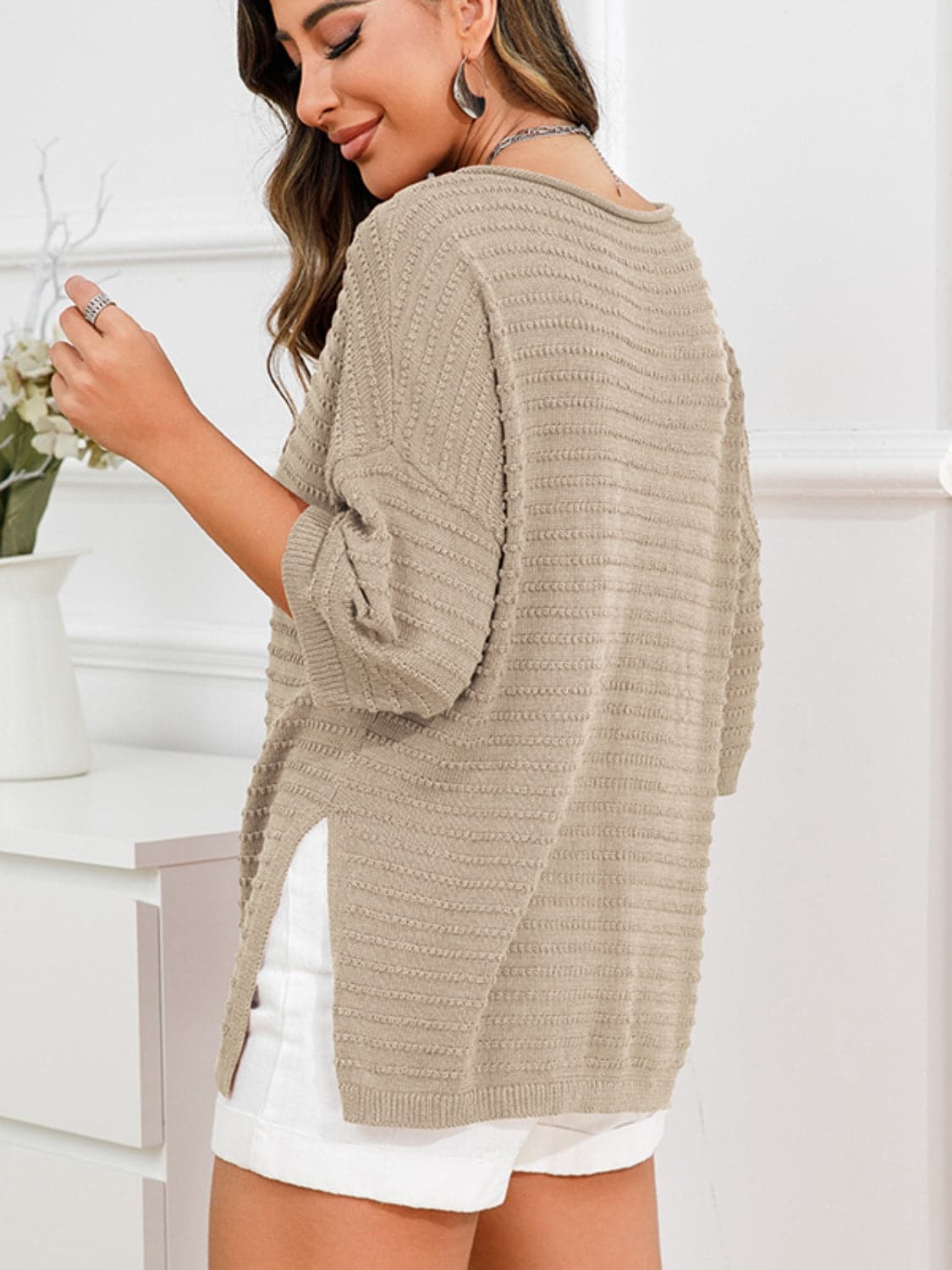 Rolled Round Neck Dropped Shoulder Slit Sweater.