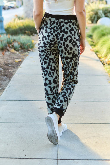 Celeste Design Full Size Leopard Contrast Sweatpants.