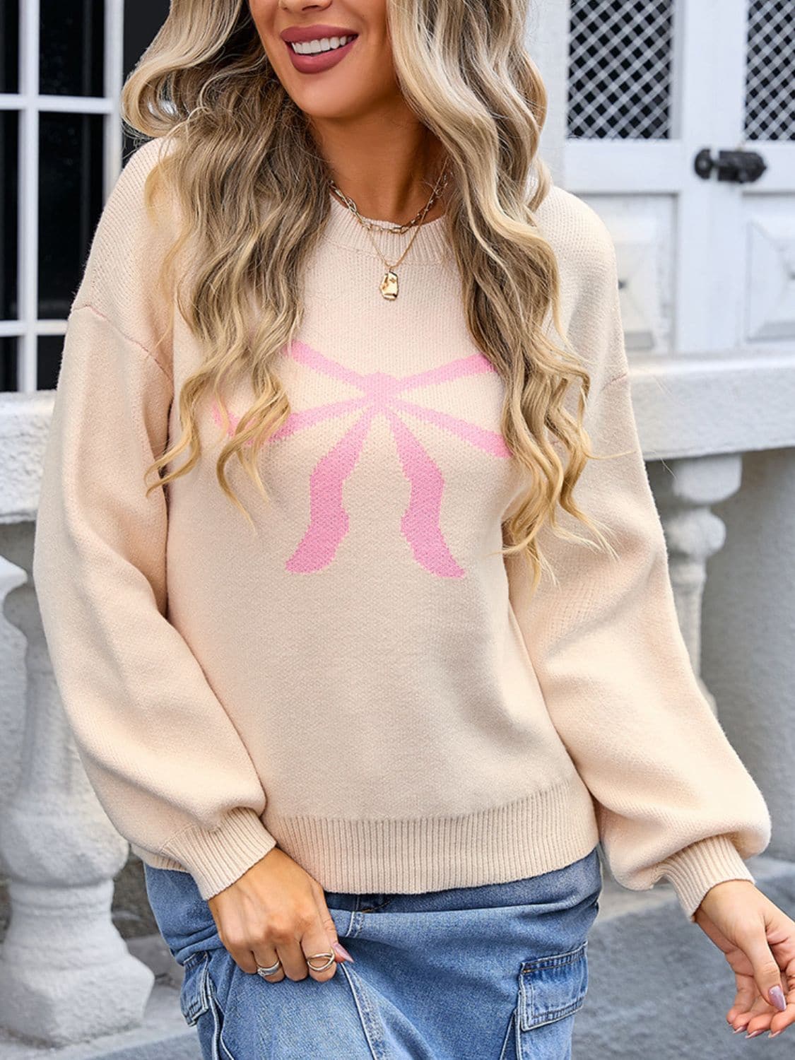 Bow Graphic Round Neck Long Sleeve Sweater.