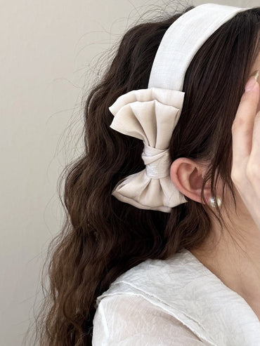 Chic polyester bow headband for stylish looks