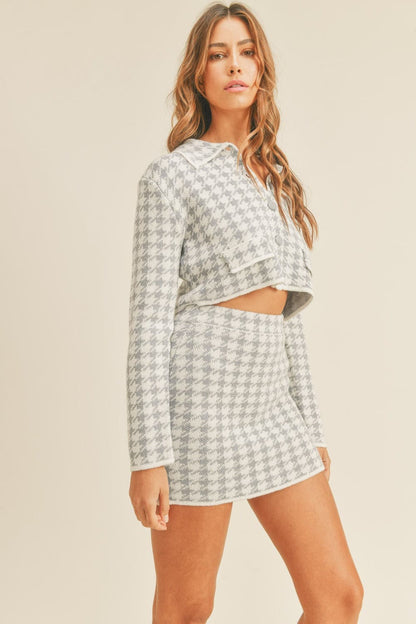 Chic houndstooth knit cardigan and mini skirt ensemble