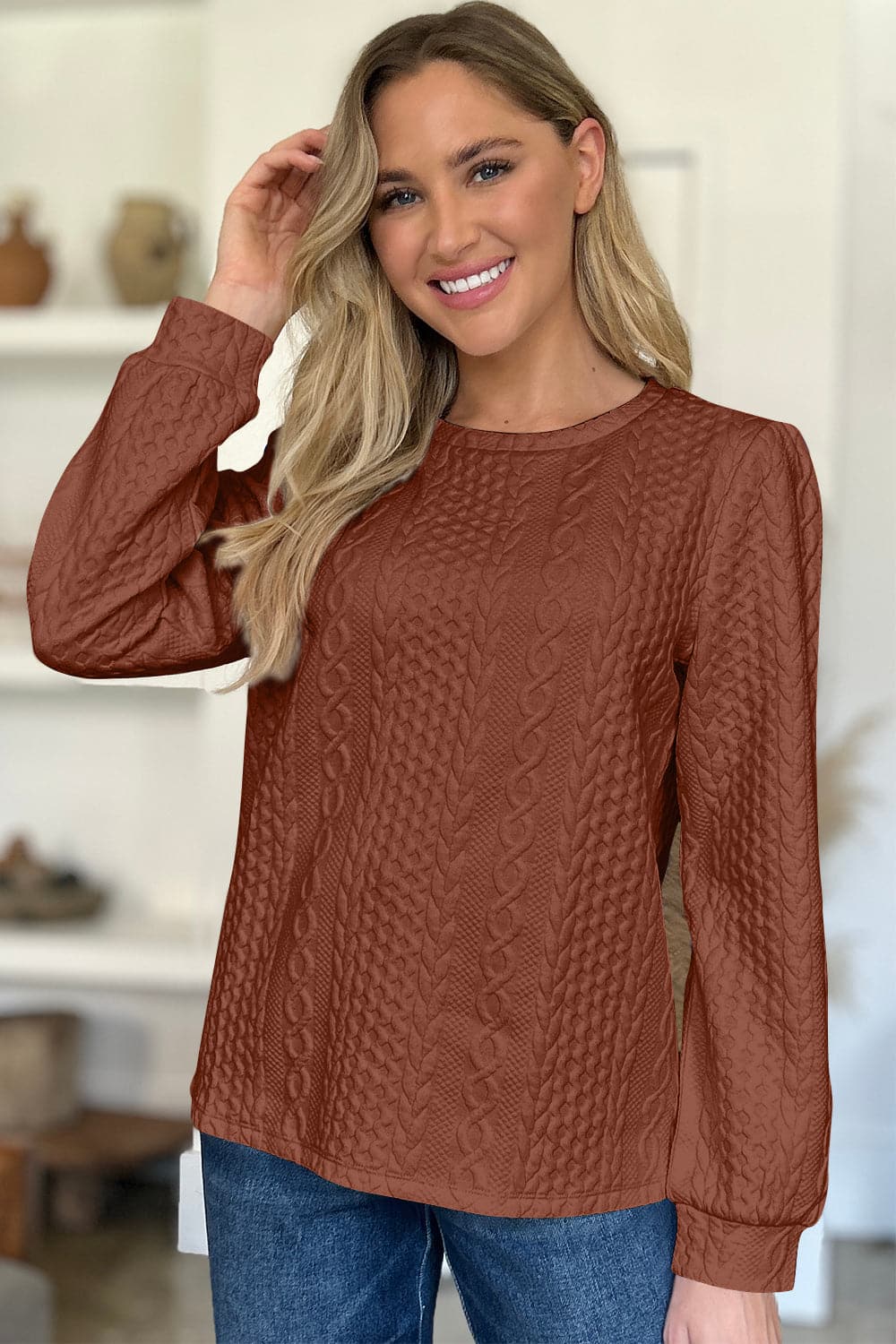 Textured Round Neck Long Sleeve Sweatshirt.