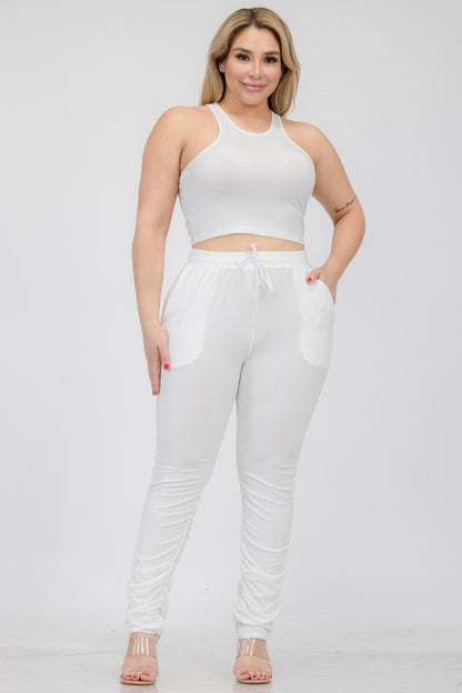 Chic plus size crop tank and ruched pants ensemble