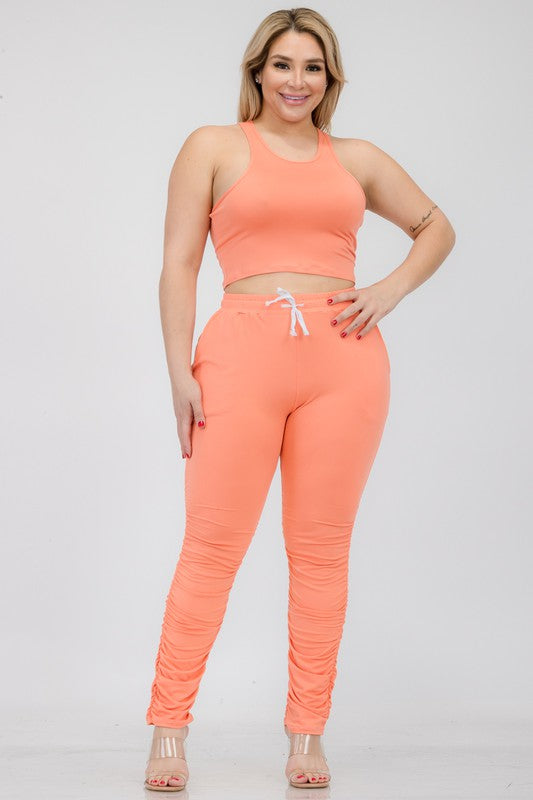 Chic plus size crop tank and ruched pants ensemble