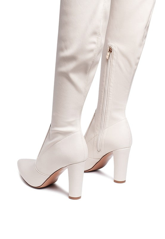 Stylish thigh-high patent boots