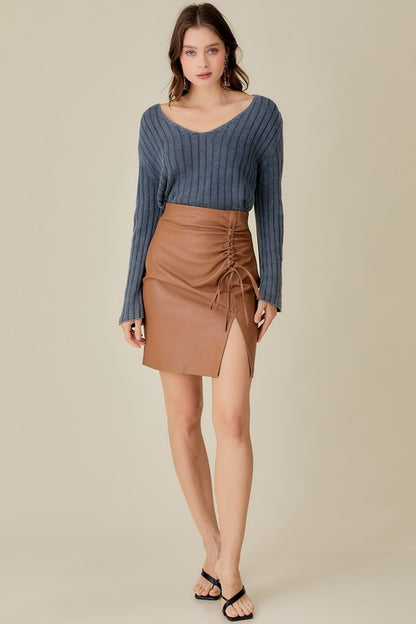 Relaxed V-neck cropped sweater with a vintage wash