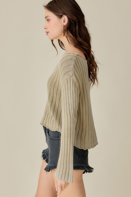 Relaxed V-neck cropped sweater with a vintage wash