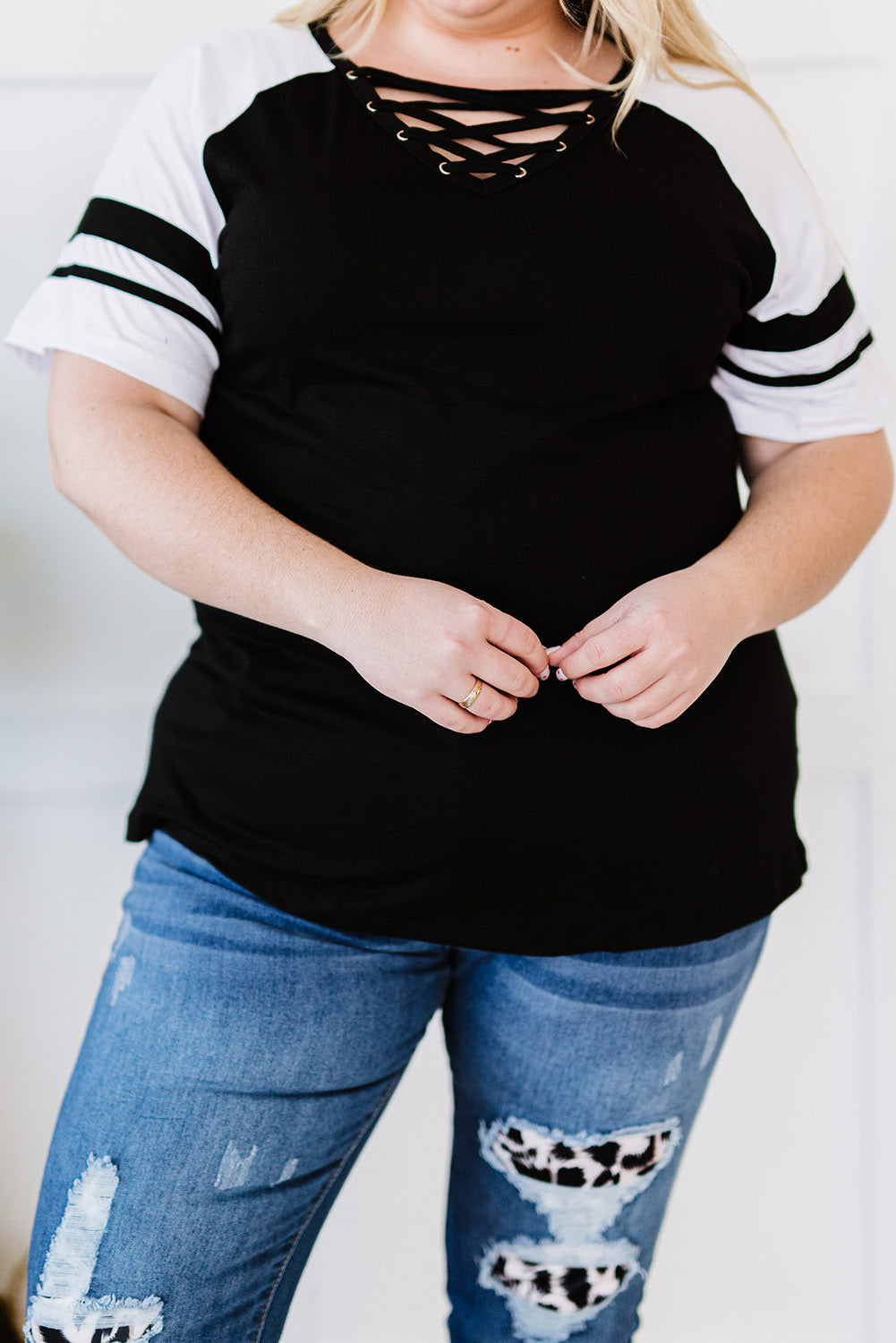 Chic black crisscross v-neck plus size tee with raglan sleeves