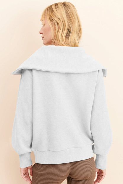 Pocketed Quarter Zip Collared Neck Sweatshirt.