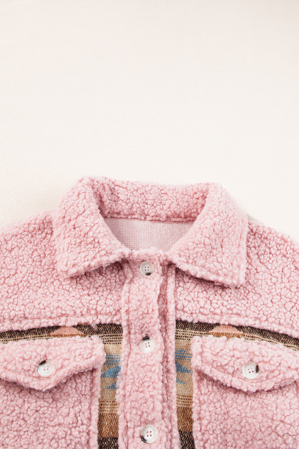 Cozy pink Aztec print sherpa coat with flap pockets