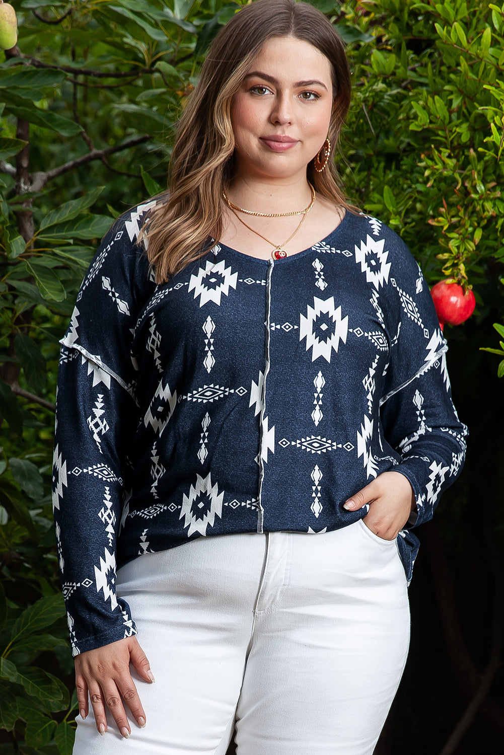 Chic gray plus size Aztec print v-neck top with exposed seams